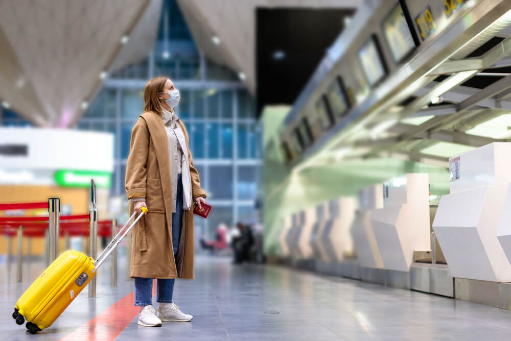 Masked woman at airport