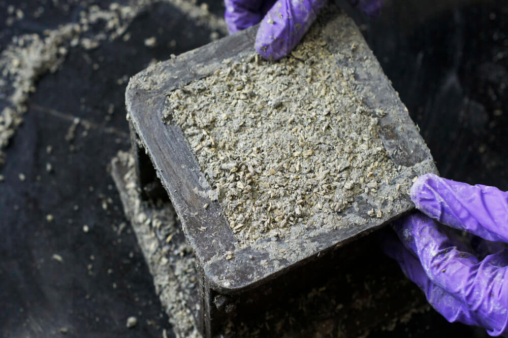 Hempcrete poured into a cube for sustainable building