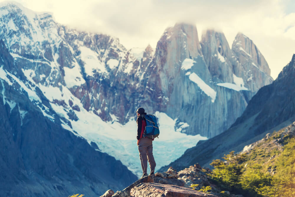 man hiking on a mountain