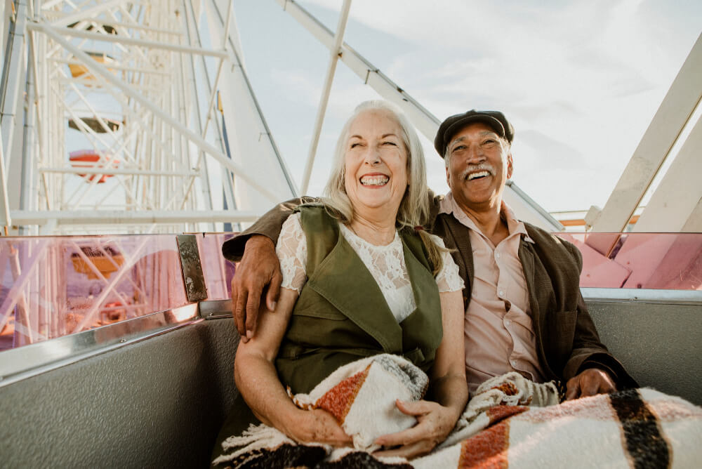 Couple over 65 on a ferris wheel
