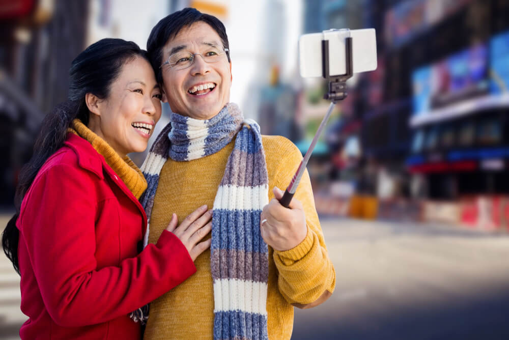 Over 65 couple taking a selfie in New York City