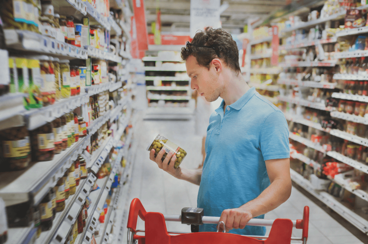 man shopping at the grocery store