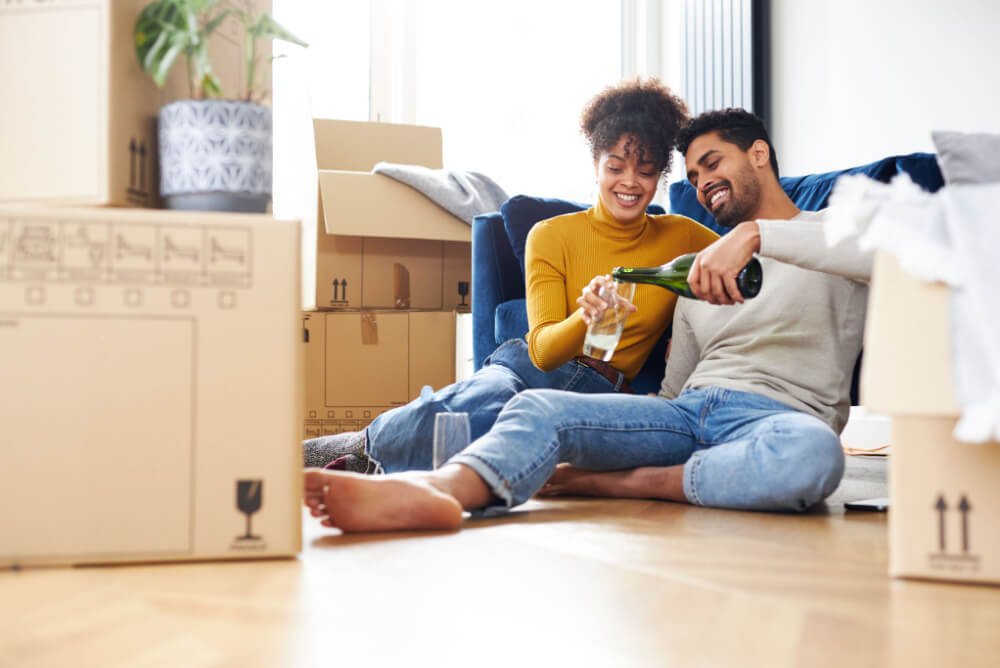 couple relaxing in their new home