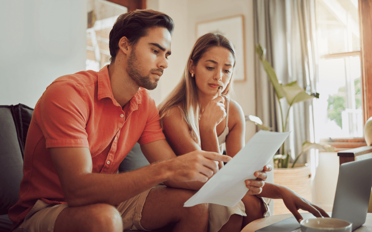 couple checking their home and contents policy