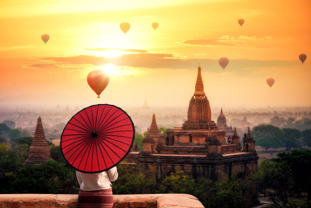 Burmese woman in Asia with umbrella