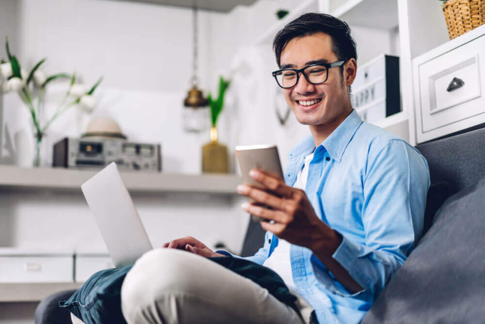 man on phone to calculate car insurance