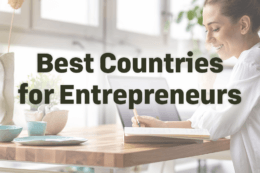 a woman working at a desk with a title card overlay reading "Best Countries for Entrepreneurs"