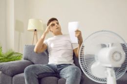 man saving on energy bills in summer