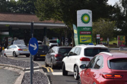 people lining up to get fuel