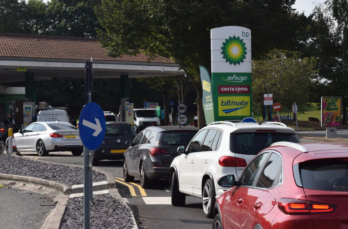 people lining up to get fuel
