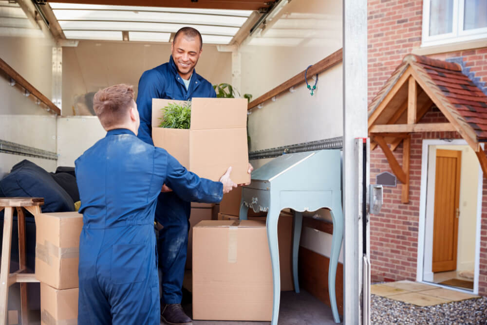 Removalist unpacking boxes on moving day