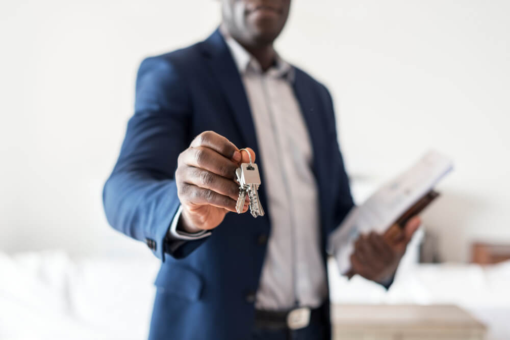 real estate agent holding keys