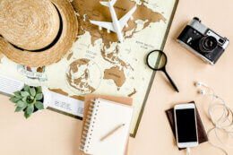 Map and other travel items for planning a trip