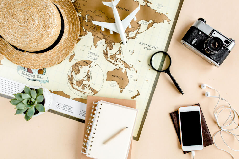 Map and other travel items for planning a trip