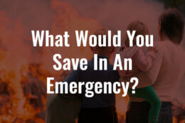 people leaving home in an emergency with the words "What Would You Save In An Emergency?" overlaid on the top