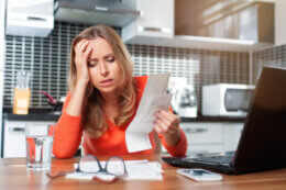 woman struggling with cost of living pressures
