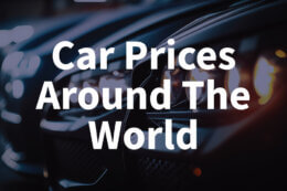 An image of a car's headlights with the words "Car Prices Around The World" overlaid on top