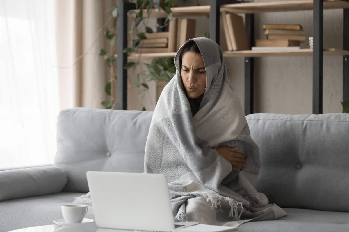 woman not using heating in winter