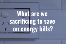 a power plug on the wall with the words "what are we sacrificing to save on energy bills?"
