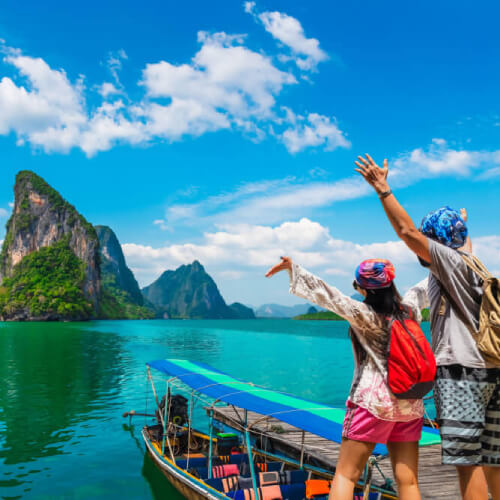 Couple on holiday with travel insurance in Thailand