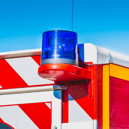 Ambulance arriving to patient with ambulance cover