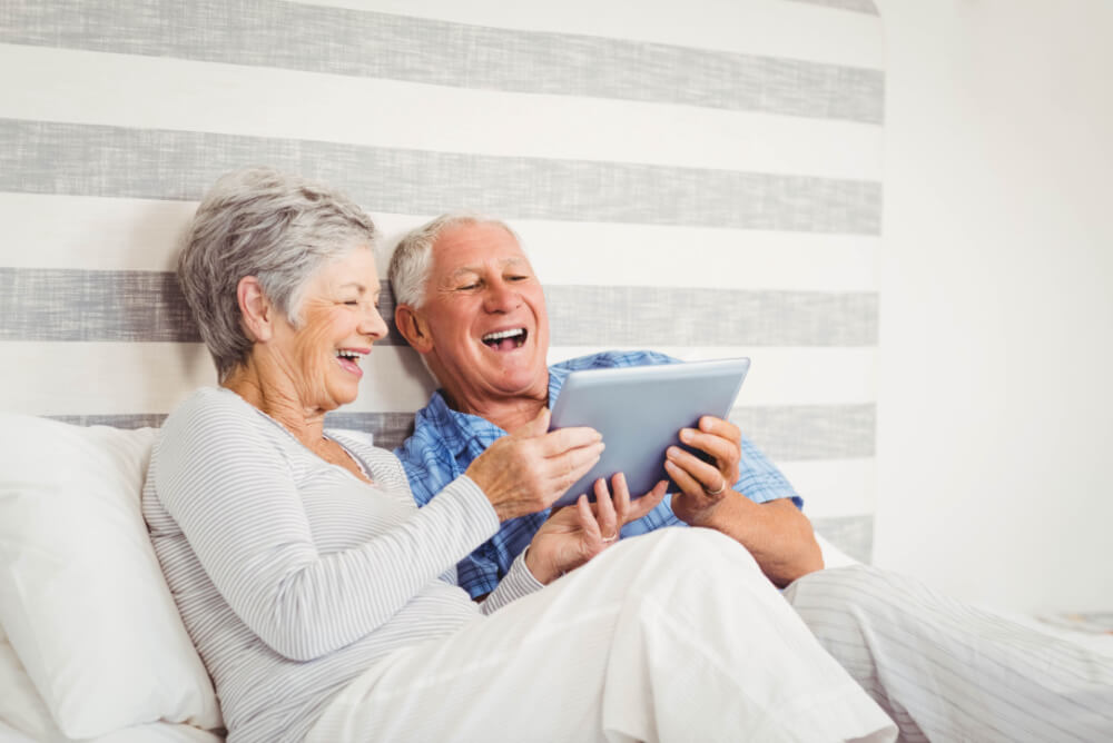 Couple compare senior home insurance