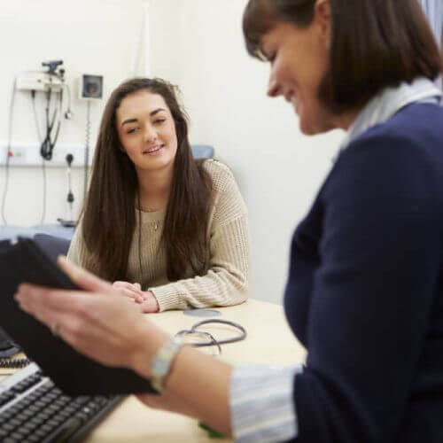Woman learns about Medicare and private health insurance