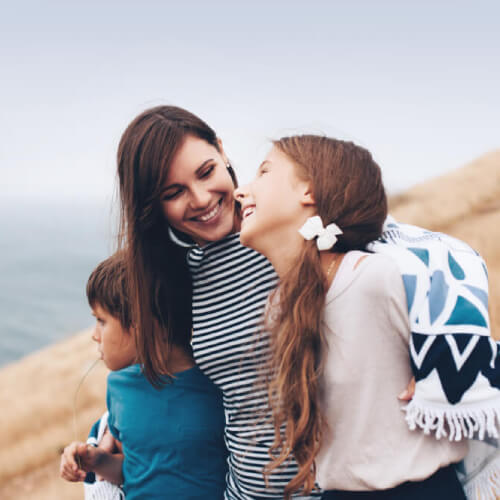 Mother and child with family health insurance