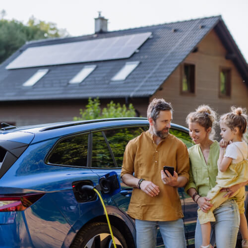 Family with an electric vehicle and solar power