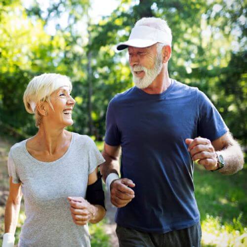 Older couple enjoy exercising with pacemaker