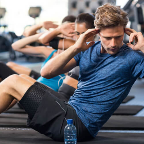 Man with gym membership through health insurance