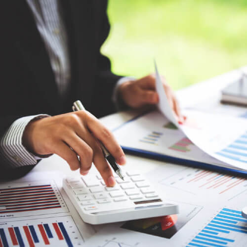 woman doing her taxes negative gearing