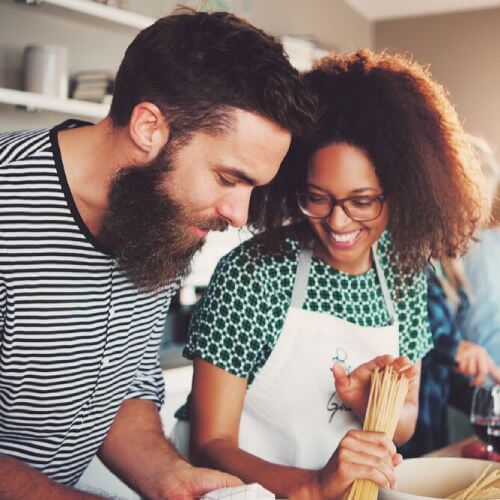 Young couple cook together