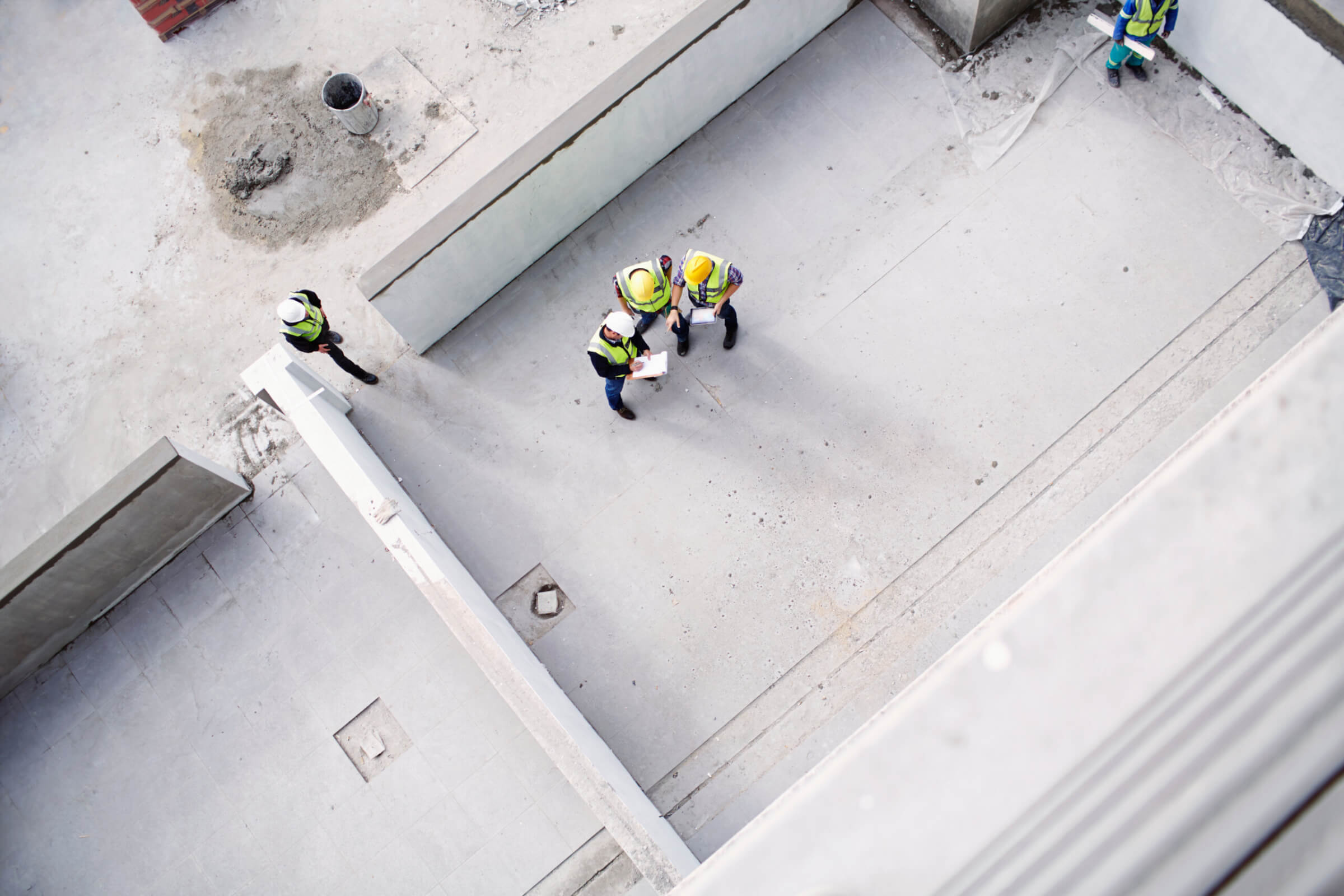 Construction workers on construction site top-view