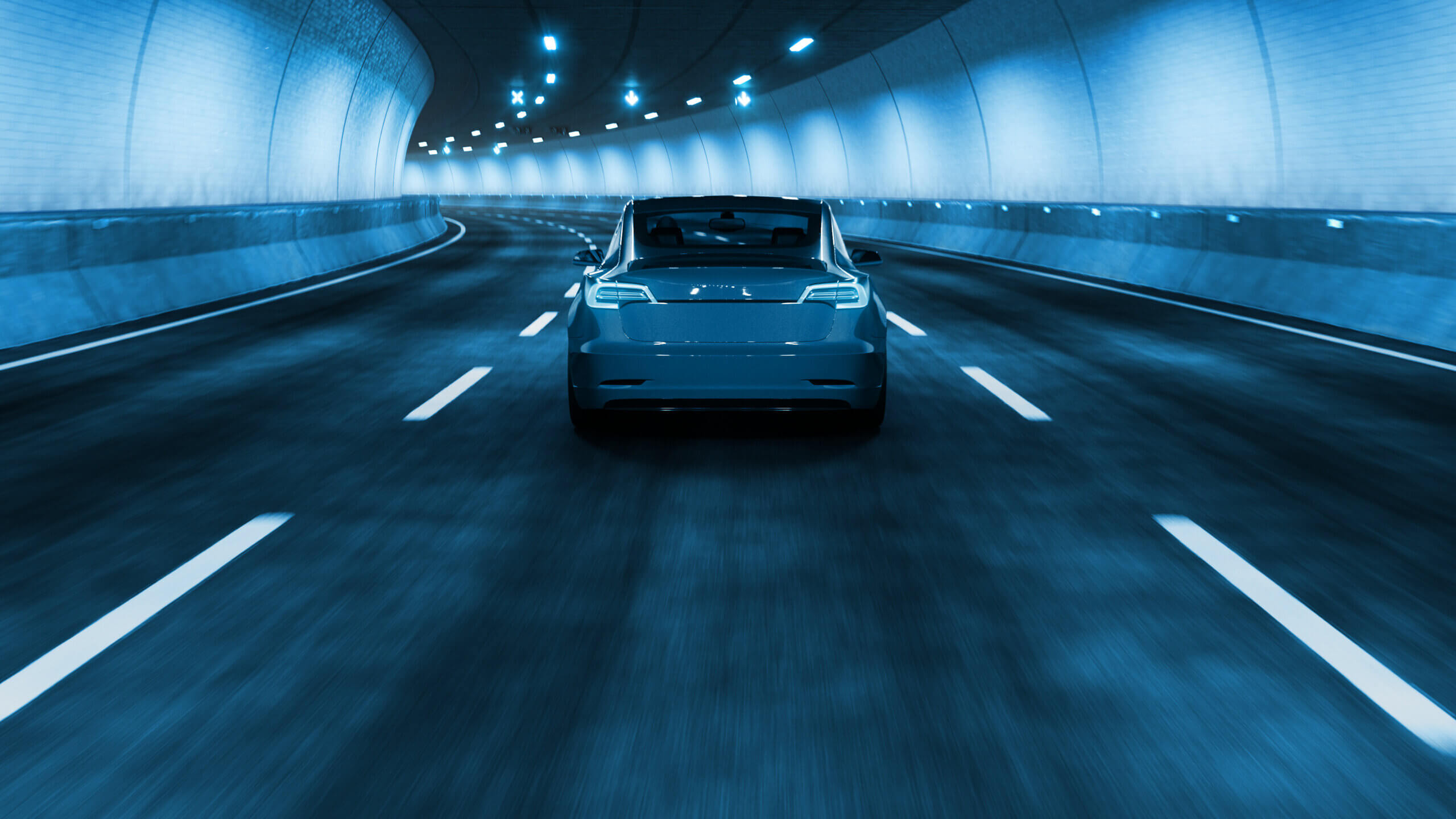 Electric car driving in tunnel with blue tint