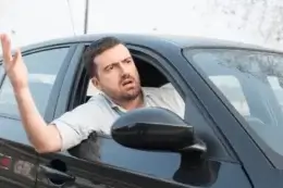 Man driver gesturing