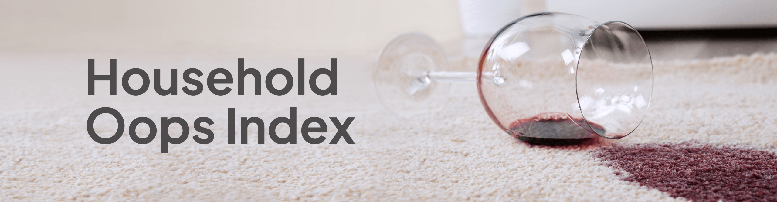 A image of a wine spilled on white carpet with the headline "Household Oops Index".